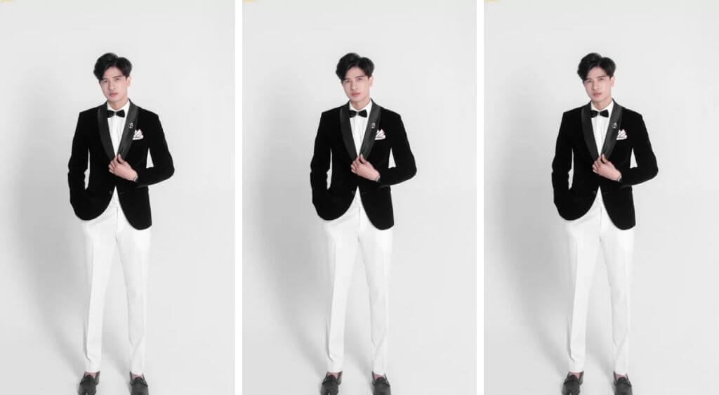 Người mẫu nam diện áo vest đen classic với sơ mi trắng