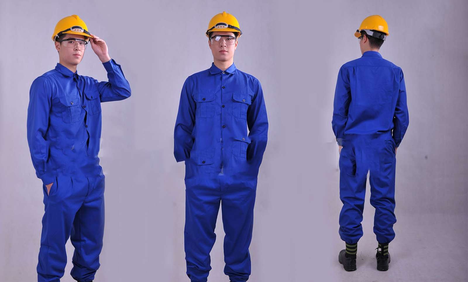 Áo khỉ bảo hộ lao động màu xanh navy trong công trường